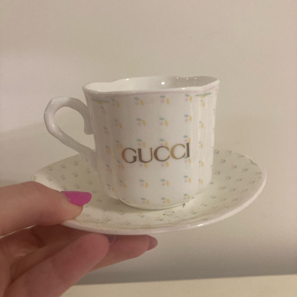 Gucci White and Gold Teacup with Saucer